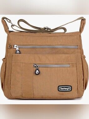 Khaki nylon waterproof messenger bag. [1]